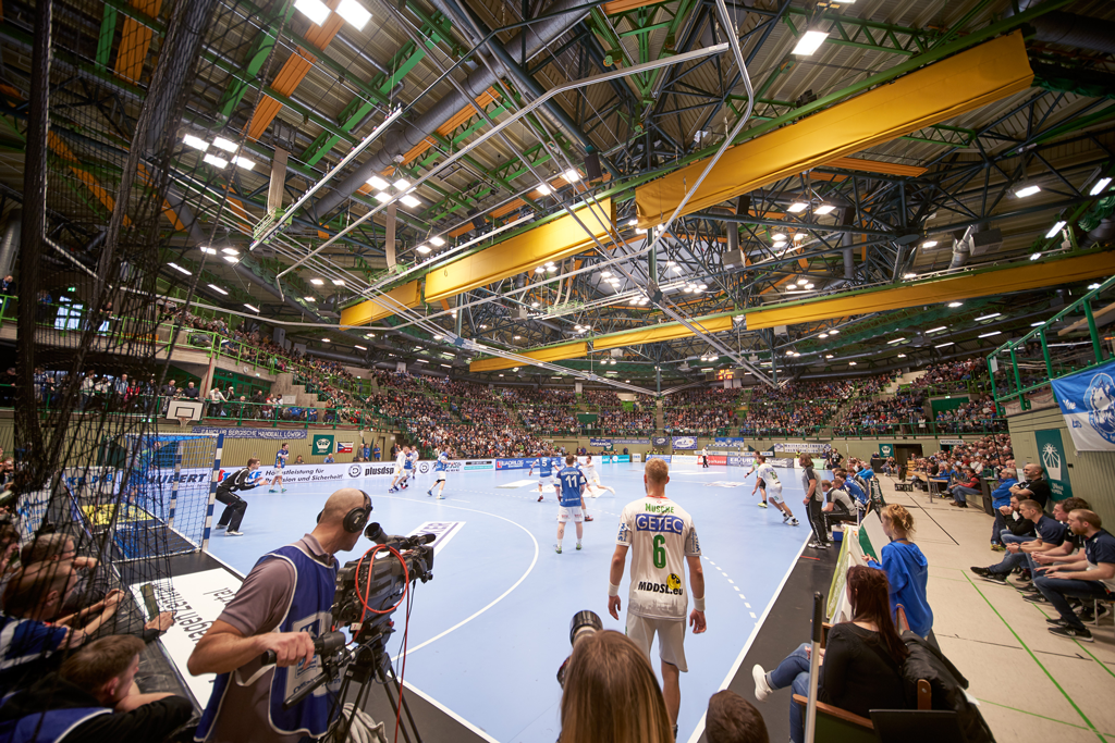 Multipurpose hall illuminated with modern LED technology for handball matches, concerts, and events, equipped with NORKA luminaires.
